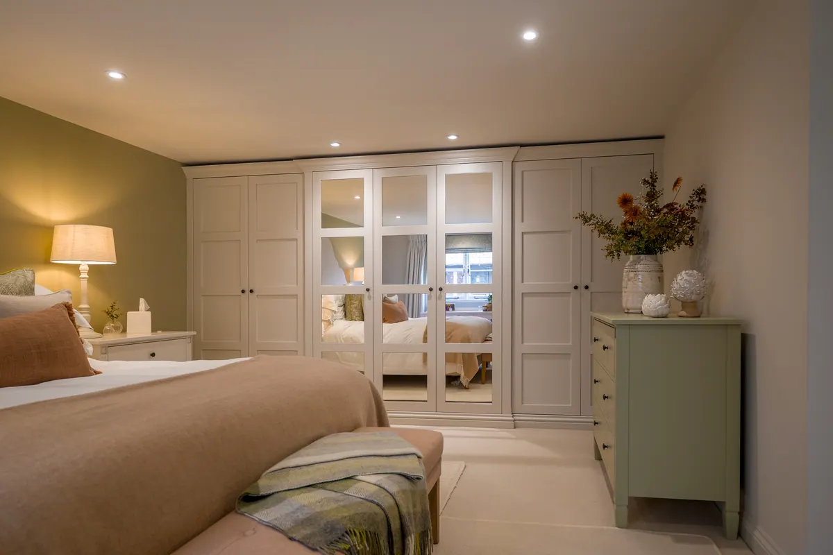 Painted fitted wardrobes by Charles Vivian