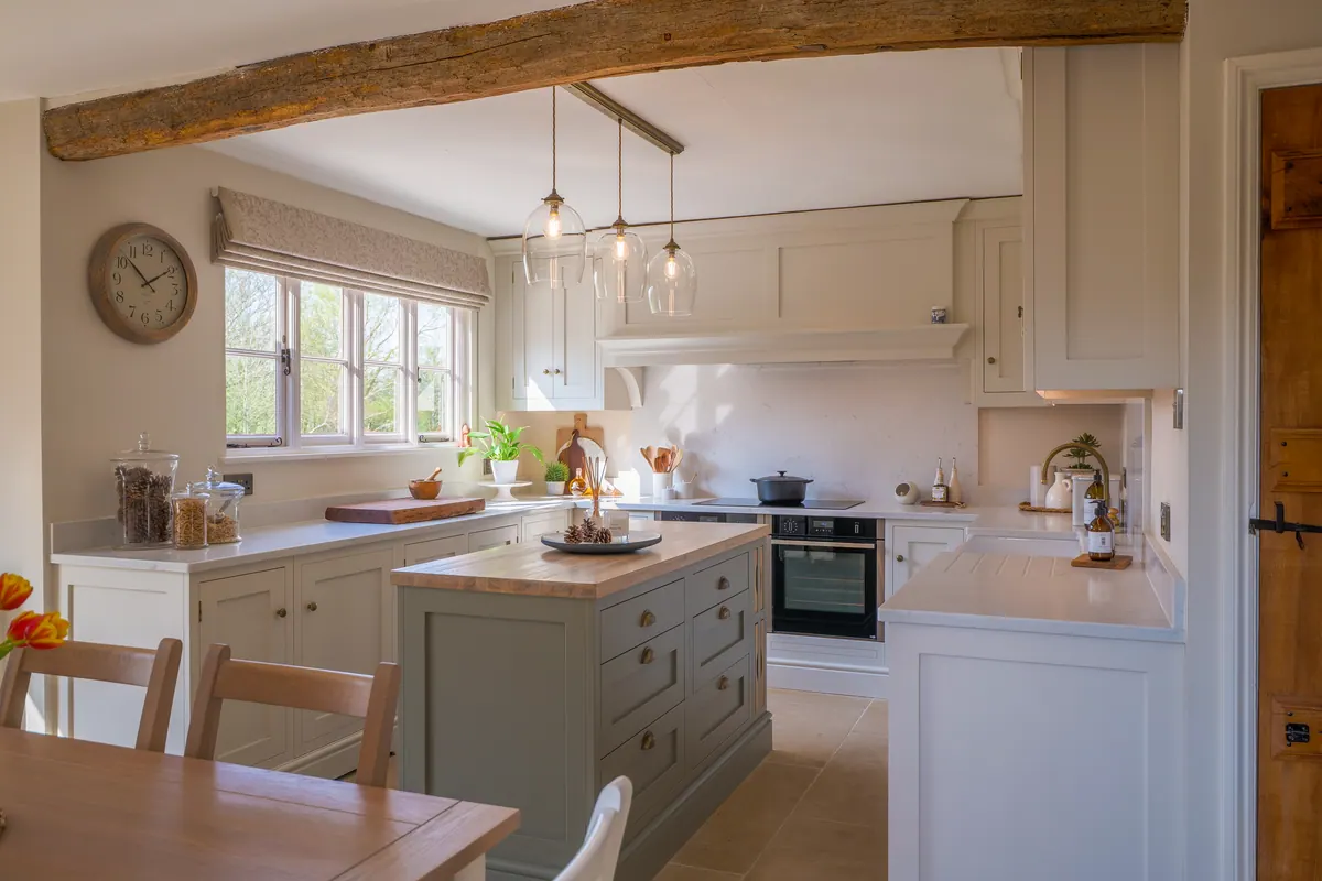 A refurbished beamed cottage kitchen by Charles Vivian